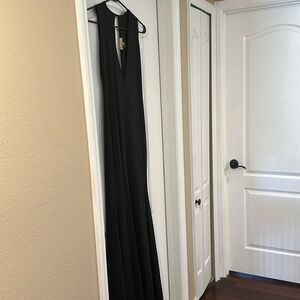Beautiful Lurelly black gown made in LA is exquisite. Size 2. Double lined.